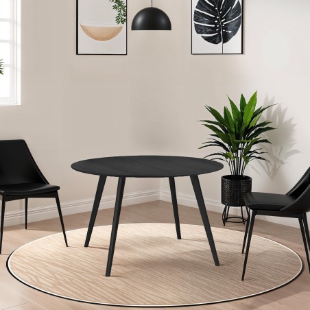 De finition noire, voici la table à manger ronde (Ø 120 cm) en bois de qualité