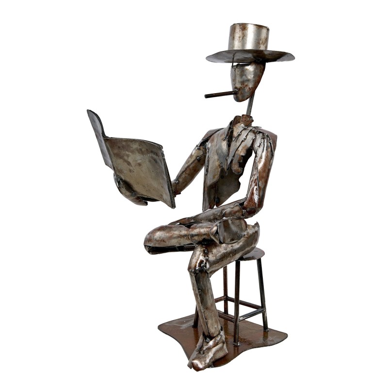 Metal statue representing a storyteller inviting meditation