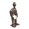 Estatua de metal CHARLOT con aspecto relajado